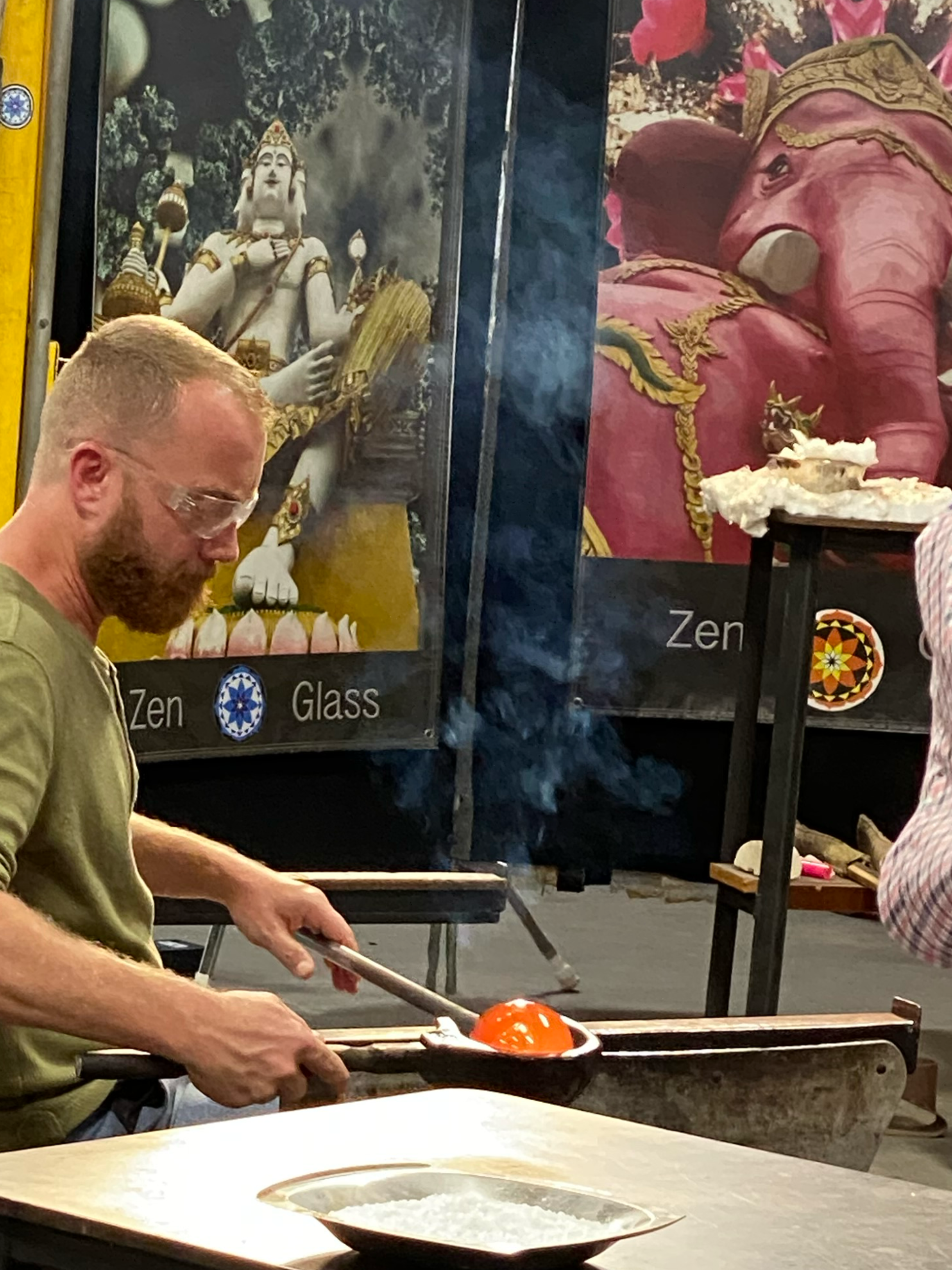 Keith Bynum blowing glass at Zen Glass Studio